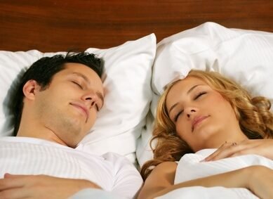 sleeping young couple