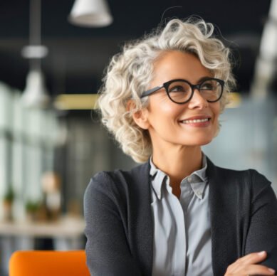 Proud and confident woman reflecting on a recent business achievement with satisfaction and gratitude, with her looking towards the sky in search of new ideas